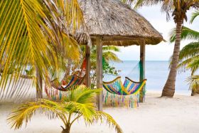 Beach in Placencia, Belize, with two hammocks – Best Places In The World To Retire – International Living